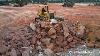 Massive Filling Project Expert Komatsu Bulldozer Pushing Rocks And 25ton Dump Trucks Operation